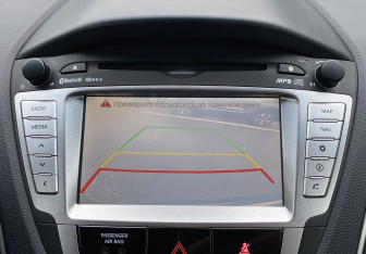 Подержанный автомобиль Hyundai ix35 2013 года (18 фото)