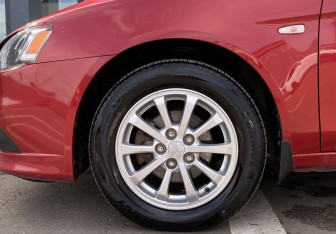 Подержанный автомобиль Mitsubishi Lancer Sedan 2012 года (9 фото)