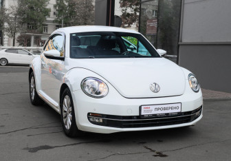 Подержанный автомобиль Volkswagen Beetle Hatchback 2014 года (3 фото)