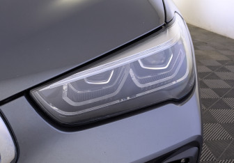 Подержанный автомобиль BMW X1 2022 года (11 фото)