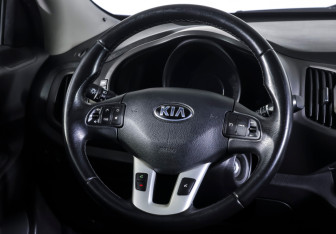 Подержанный автомобиль Kia Sportage 2013 года (13 фото)