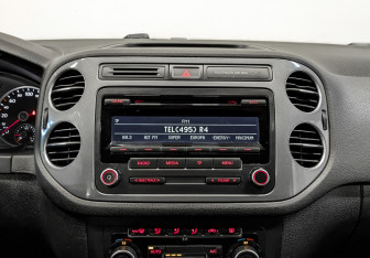 Подержанный автомобиль Volkswagen Tiguan 2014 года (15 фото)