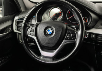Подержанный автомобиль BMW X6 2016 года (15 фото)