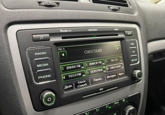 Подержанный автомобиль Skoda Octavia Liftback 2013 года (13 фото)