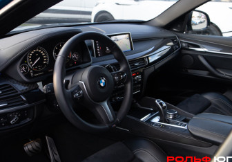 Подержанный автомобиль BMW X6 2018 года (10 фото)
