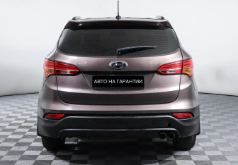 Подержанный автомобиль Hyundai Santa Fe 2013 года (4 фото)