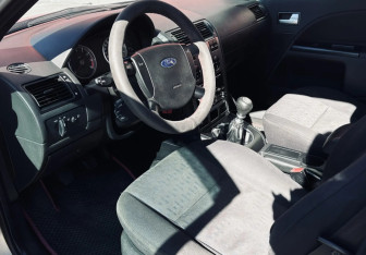 Подержанный автомобиль Ford Mondeo Liftback 2001 года (9 фото)