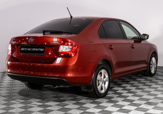 Подержанный автомобиль Skoda Rapid Liftback 2014 года (3 фото)