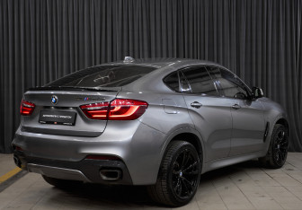 Подержанный автомобиль BMW X6 2014 года (4 фото)