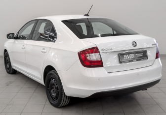 Подержанный автомобиль Skoda Rapid Liftback 2018 года (7 фото)