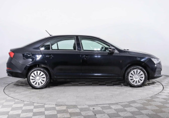 Подержанный автомобиль Skoda Rapid Liftback 2021 года (4 фото)
