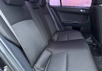 Подержанный автомобиль Mitsubishi Lancer Sedan 2012 года (11 фото)