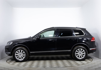 Подержанный автомобиль Volkswagen Touareg 2014 года (8 фото)