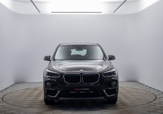 Подержанный автомобиль BMW X1 2016 года (2 фото)