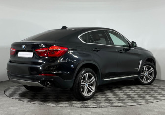 Подержанный автомобиль BMW X6 2015 года (2 фото)