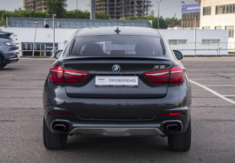 Подержанный автомобиль BMW X6 2016 года (6 фото)