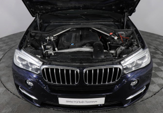 Подержанный автомобиль BMW X5 2014 года (10 фото)
