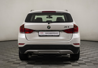 Подержанный автомобиль BMW X1 2014 года (6 фото)