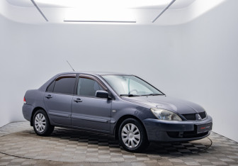 Подержанный автомобиль Mitsubishi Lancer Sedan 2009 года (3 фото)