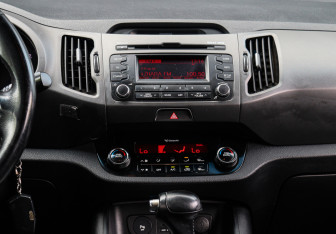 Подержанный автомобиль Kia Sportage 2012 года (11 фото)