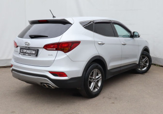 Подержанный автомобиль Hyundai Santa Fe 2015 года (4 фото)