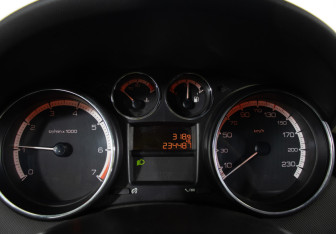 Подержанный автомобиль Peugeot 308 Wagon 2010 года (11 фото)