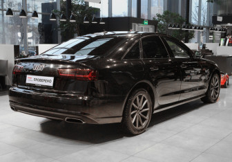 Подержанный автомобиль Audi A6 Sedan 2015 года (4 фото)