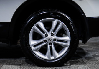 Подержанный автомобиль Nissan Qashqai+2 2010 года (15 фото)