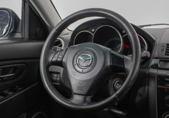 Подержанный автомобиль Mazda 3 Sedan 2008 года (15 фото)