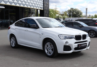 Подержанный автомобиль BMW X4 2015 года (3 фото)