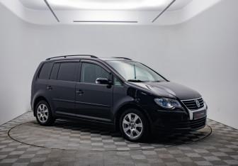 Подержанный автомобиль Volkswagen Touran 2008 года (3 фото)