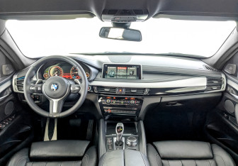 Подержанный автомобиль BMW X6 2018 года (14 фото)