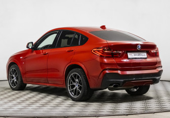 Подержанный автомобиль BMW X4 2015 года (7 фото)