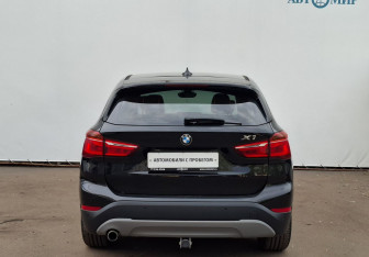Подержанный автомобиль BMW X1 2015 года (6 фото)