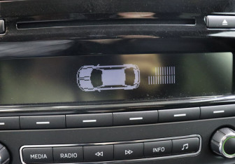 Подержанный автомобиль Skoda Rapid Liftback 2014 года (22 фото)