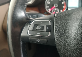 Подержанный автомобиль Volkswagen Passat Sedan 2011 года (14 фото)