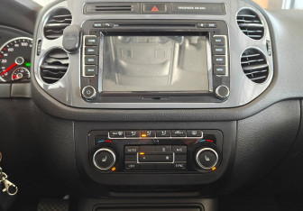 Подержанный автомобиль Volkswagen Tiguan 2014 года (13 фото)