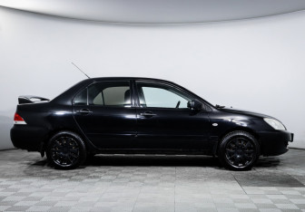 Подержанный автомобиль Mitsubishi Lancer Sedan 2009 года (4 фото)