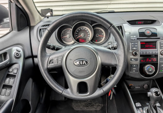 Подержанный автомобиль Kia Cerato Sedan 2012 года (21 фото)