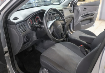 Подержанный автомобиль Kia Rio Hatchback 2011 года (15 фото)