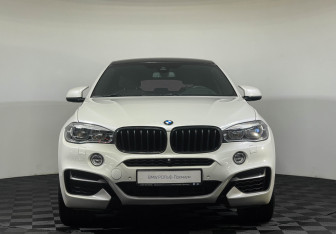 Подержанный автомобиль BMW X6 2016 года (3 фото)