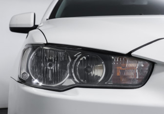 Подержанный автомобиль Mitsubishi Lancer Sedan 2012 года (20 фото)