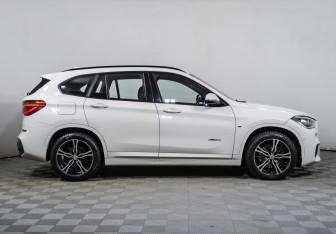 Подержанный автомобиль BMW X1 2015 года (4 фото)