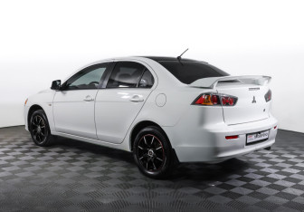 Подержанный автомобиль Mitsubishi Lancer Sedan 2012 года (7 фото)