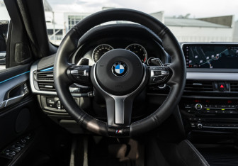 Подержанный автомобиль BMW X6 2018 года (10 фото)