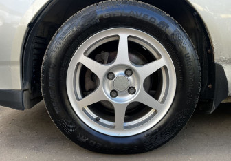 Подержанный автомобиль Toyota Corolla Hatchback 2004 года (9 фото)