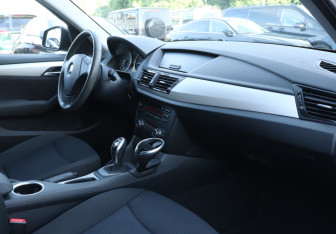 Подержанный автомобиль BMW X1 2013 года (9 фото)
