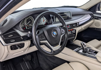 Подержанный автомобиль BMW X6 2015 года (15 фото)