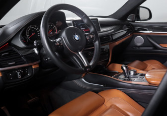 Подержанный автомобиль BMW X6 M 2018 года (14 фото)