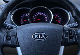 Подержанный автомобиль Kia Sorento 2012 года (15 фото)